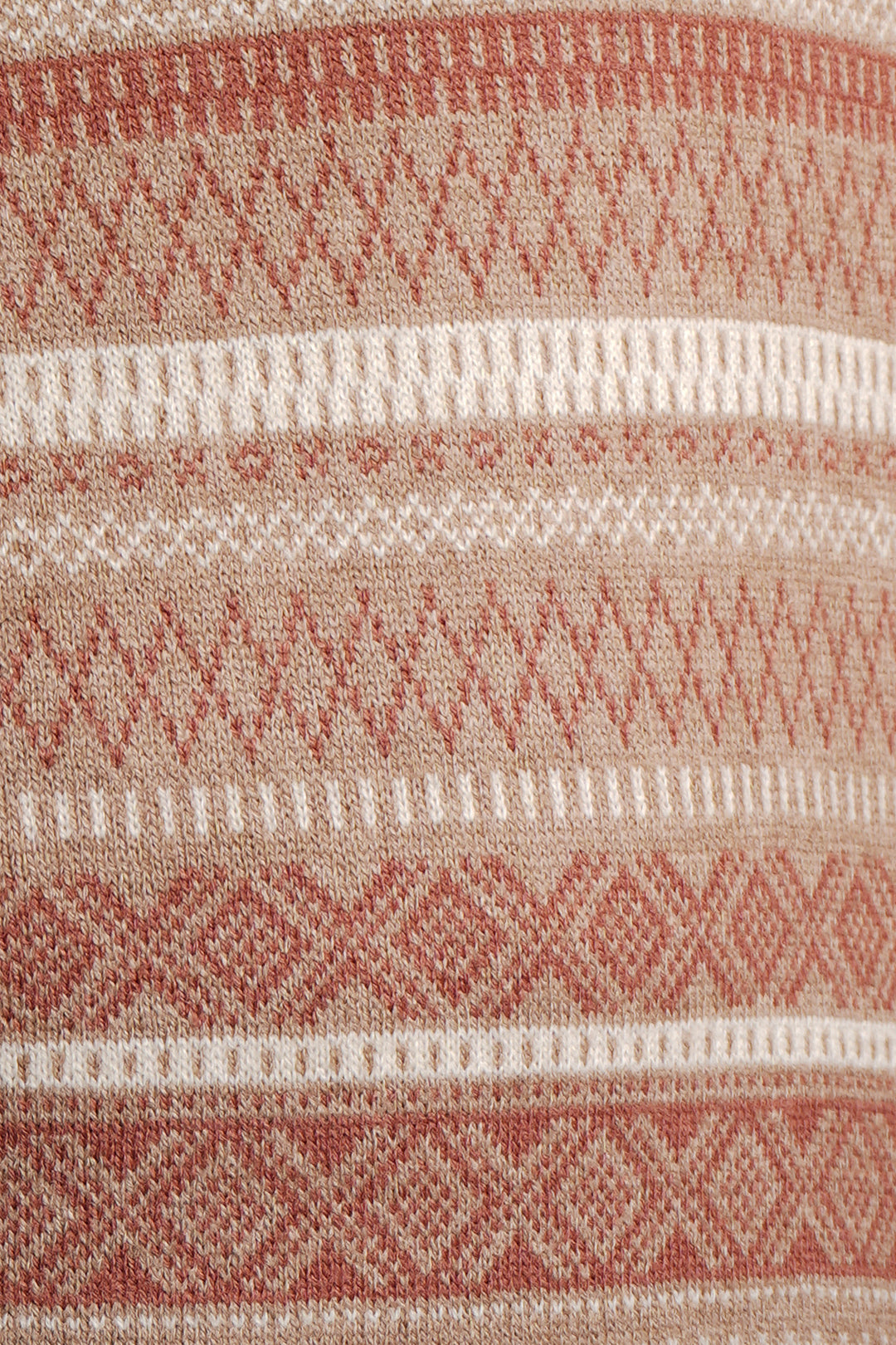 Nordic jumper with a red and beige patterned design